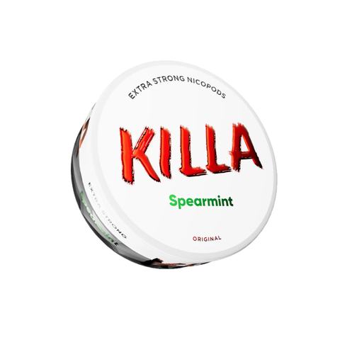 Three KILLA nicotine pouch cans seen from directly above on dark slate, one open with white pouches spilling out