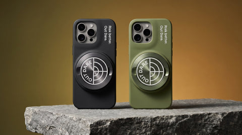 OutDare iPhone 16 Pro Max pouch-holder cases in black and olive green, each with the OUT DARE metal can mounted, on a stone slab