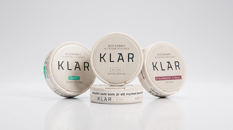 Klar nicotine pouches — Mint, Blank and Strawberry & Basil cans