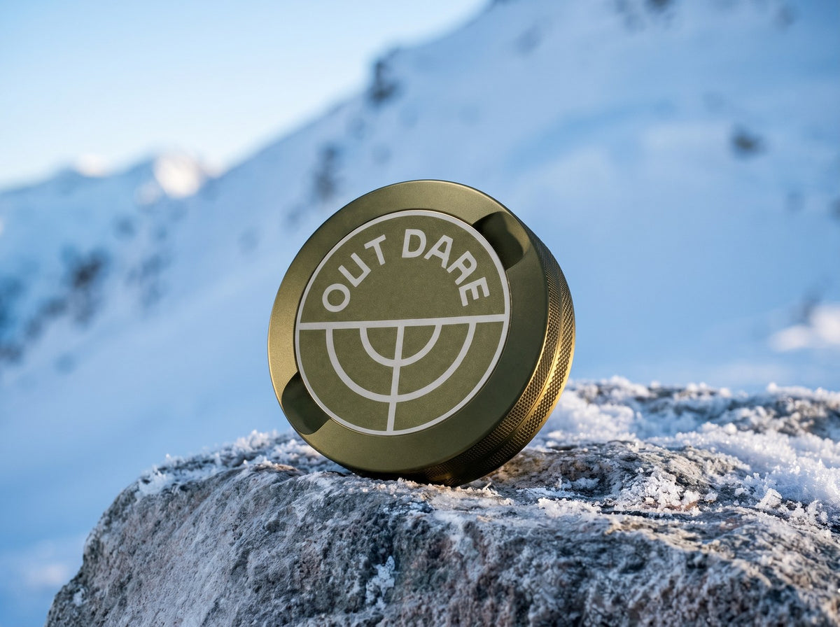 OutDare metal can on a snowy ridge